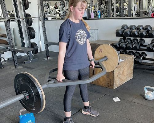 teen girl doing stand press