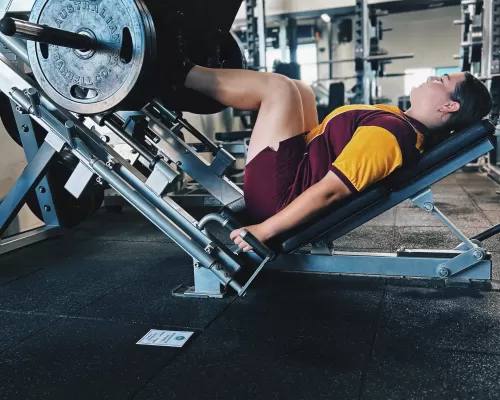 a girl doing her bench press