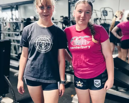 two girls at a gym