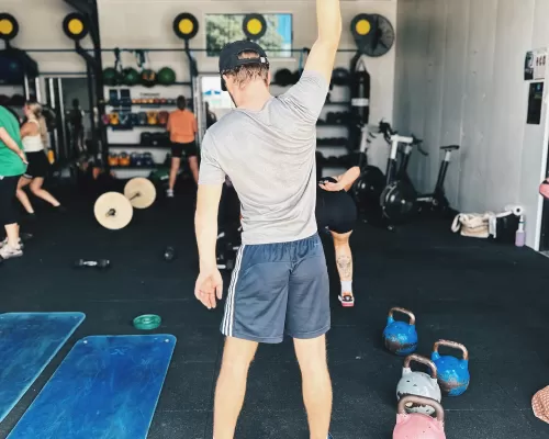 a man lifting his dumbbells