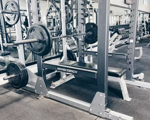 a workout bench inside a gym