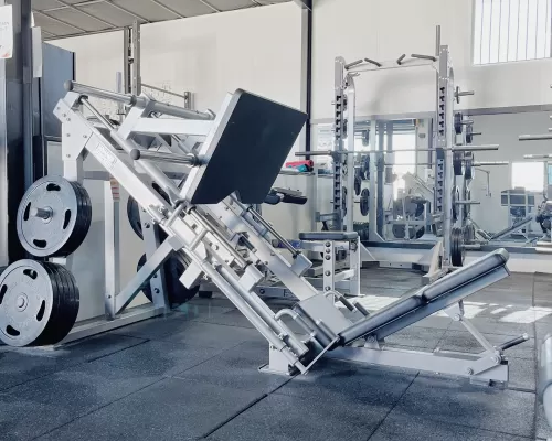 a leg press equipment at a gym