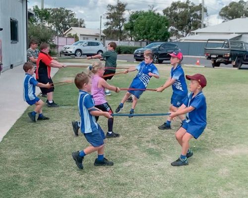 kids stretching the rubber