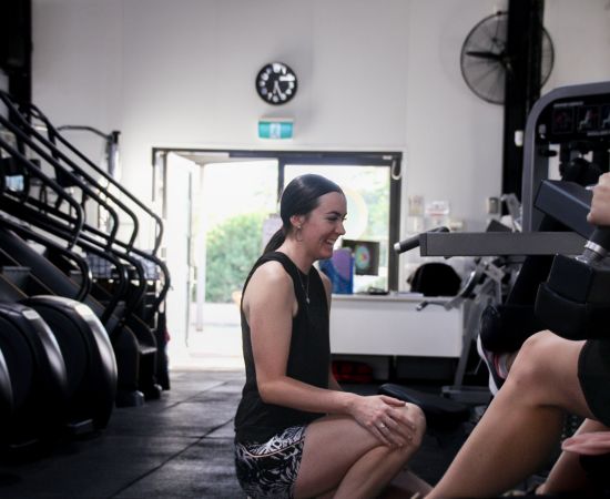 woman-on-a-gym-clothes-sitting